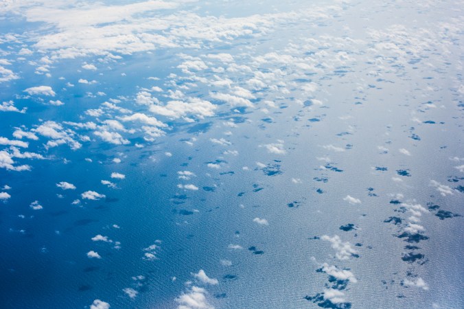 clouds-over-the-pacific-ocean-from-an-airplane-picjumbo-com
